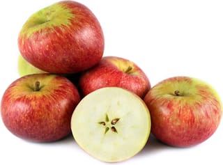 Apple 'Golden Delicious/Braeburn' fruit, red-streaked apples with green-yellow skin, one halved to show pale flesh and a star-shaped core.
