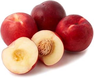Nectarine 'Snow Queen' fruit, three whole glossy red nectarines and a halved one showing pale cream flesh and the stone, on white.