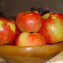 Stack of blueberry pancakes with maple syrup, a delicious breakfast treat.
